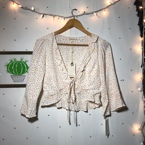 for love and lemons | star printed wrap top